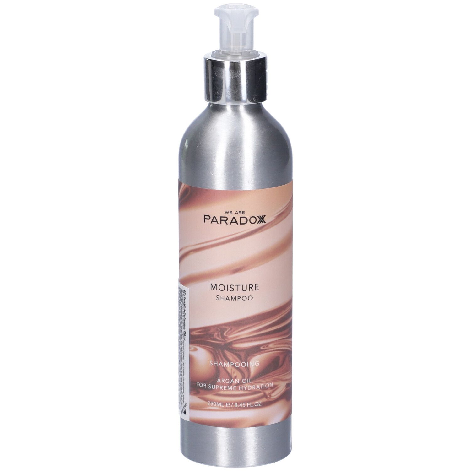 Flacone argento con dosatore. Scritta: We Are Paradox, Moisture Shampoo. Contiene olio di argan.