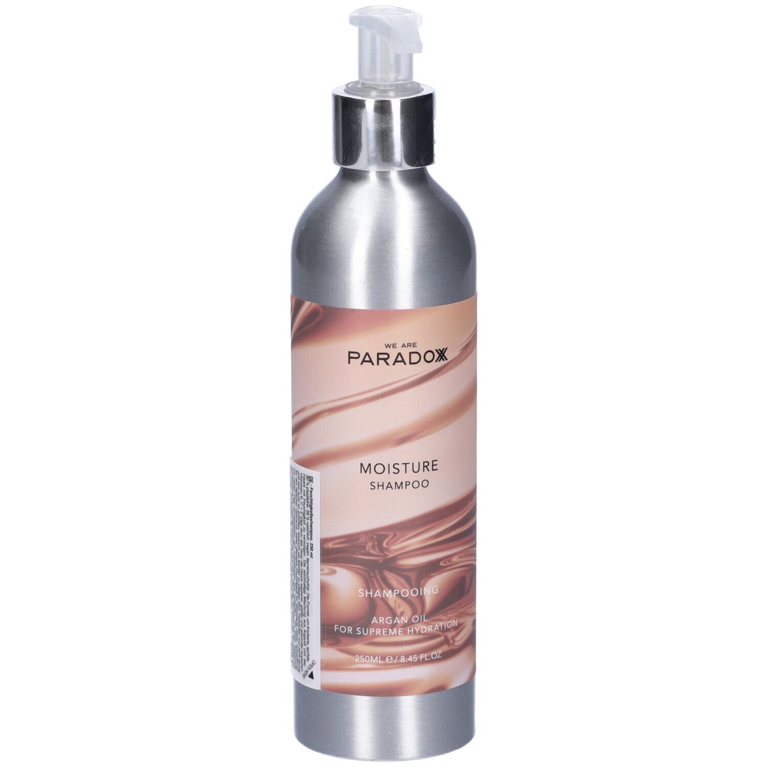 Flacone argento con dosatore. Scritta: We Are Paradox, Moisture Shampoo. Contiene olio di argan.