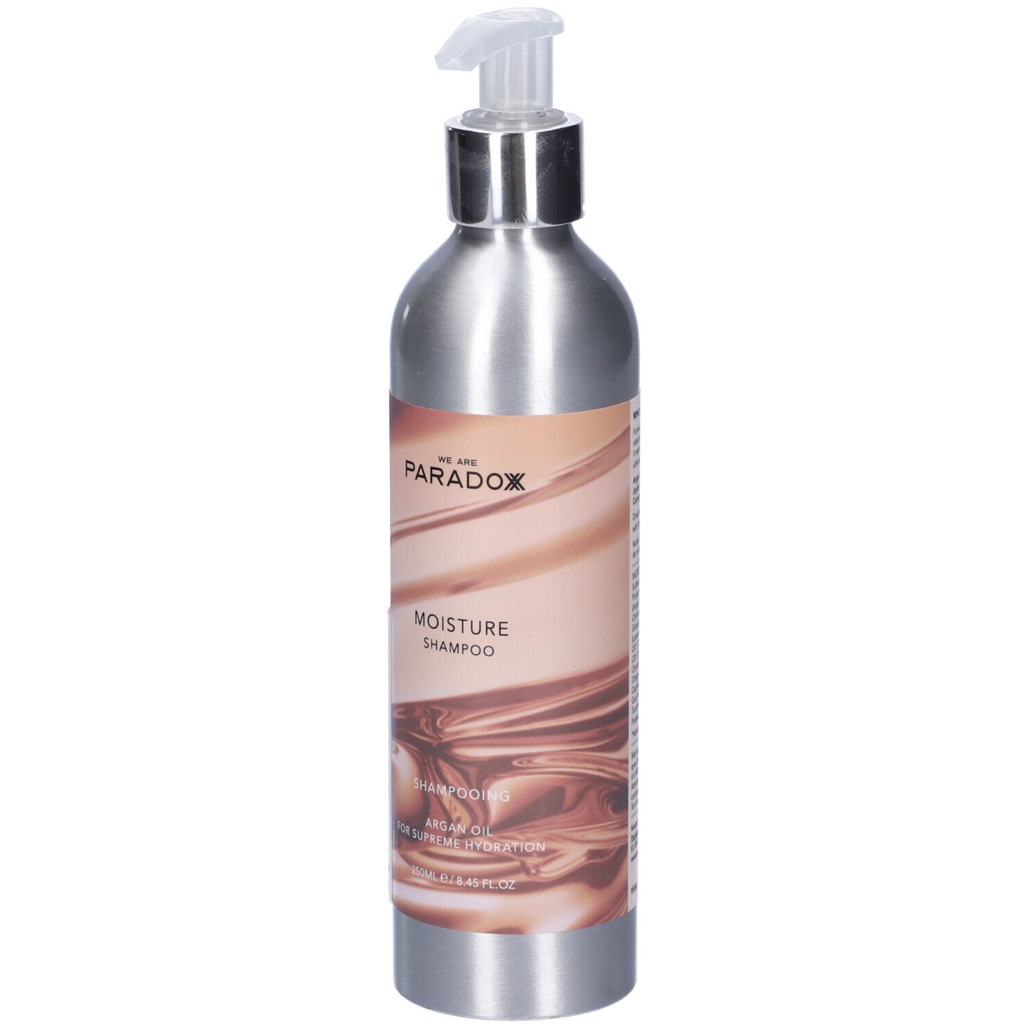 Flacone argento con dosatore. Scritta: We Are Paradox, Moisture Shampoo. Contiene olio di argan.