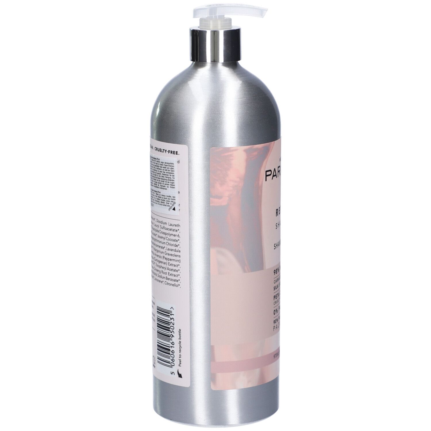 Flacone di shampoo argento, vista laterale. Etichetta rosa con testo. Pompa in alto. Testo: WE ARE PARADOX. Ingredienti e informazioni.