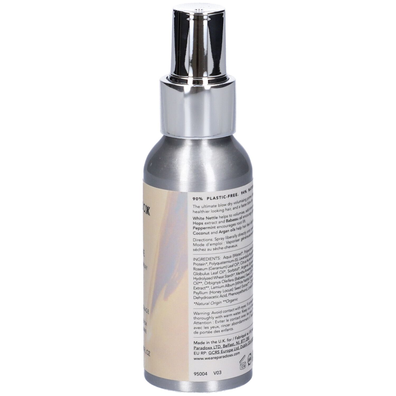 Retro del flacone spray argento. Testo: 96% Senza plastica, ingredienti, informazioni produttore. Scritta: PARADOX, VOLUME, BLOW DRY SPRAY.