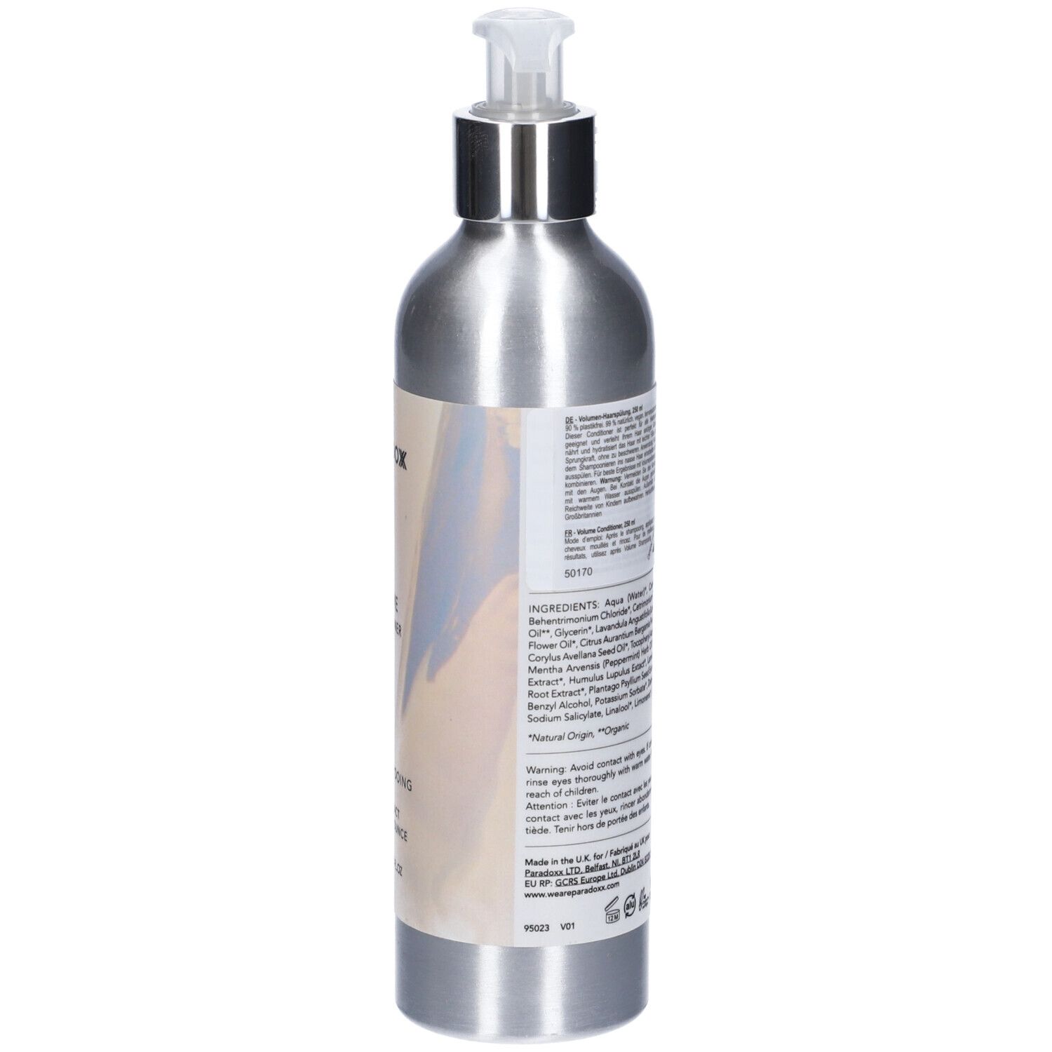 Flacone argento con dosatore. Etichetta con ingredienti e testo. "We Are Paradox Volume Conditioner".