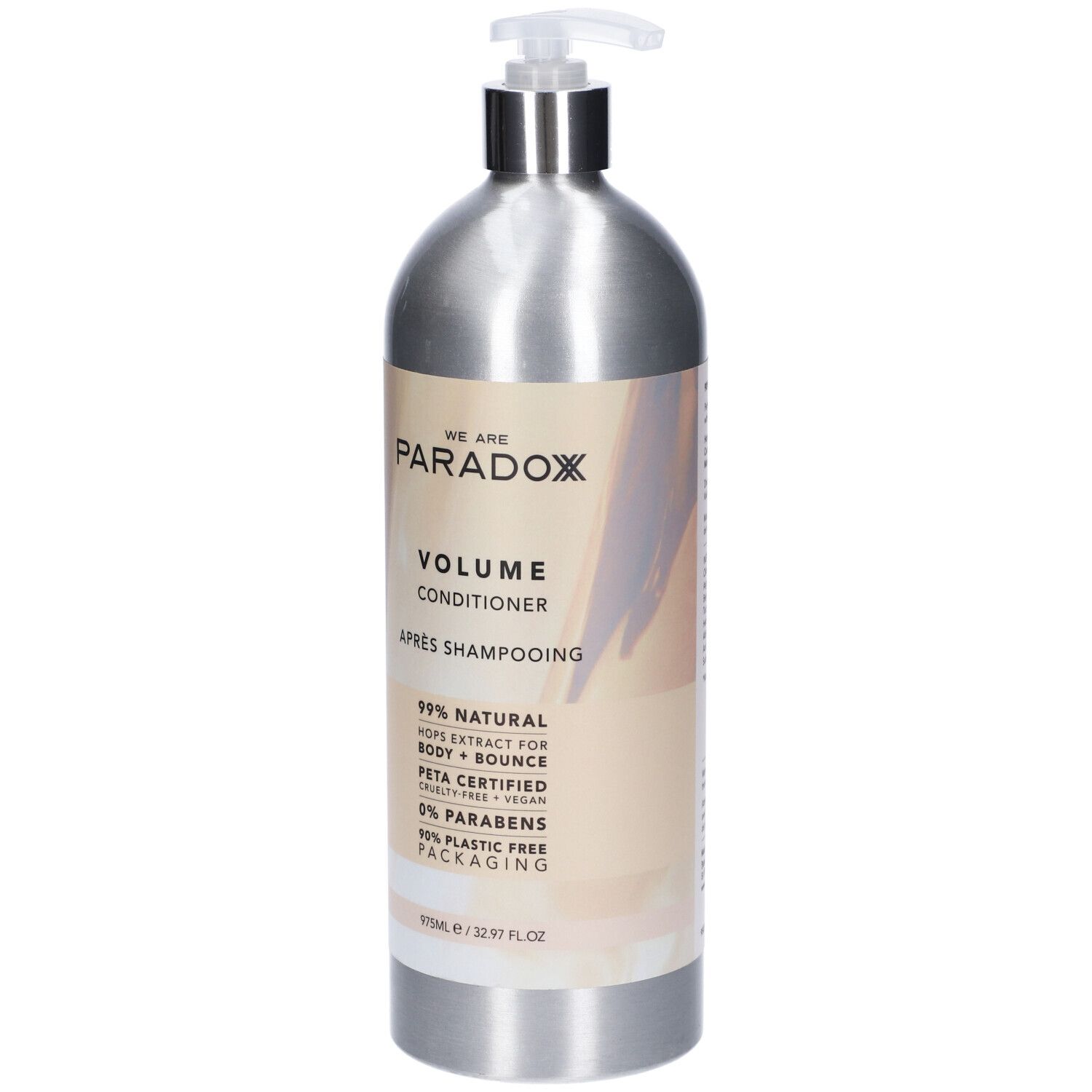 Flacone argento con dosatore. Scritta: We Are Paradox, Volume Conditioner. Certificazione PETA.