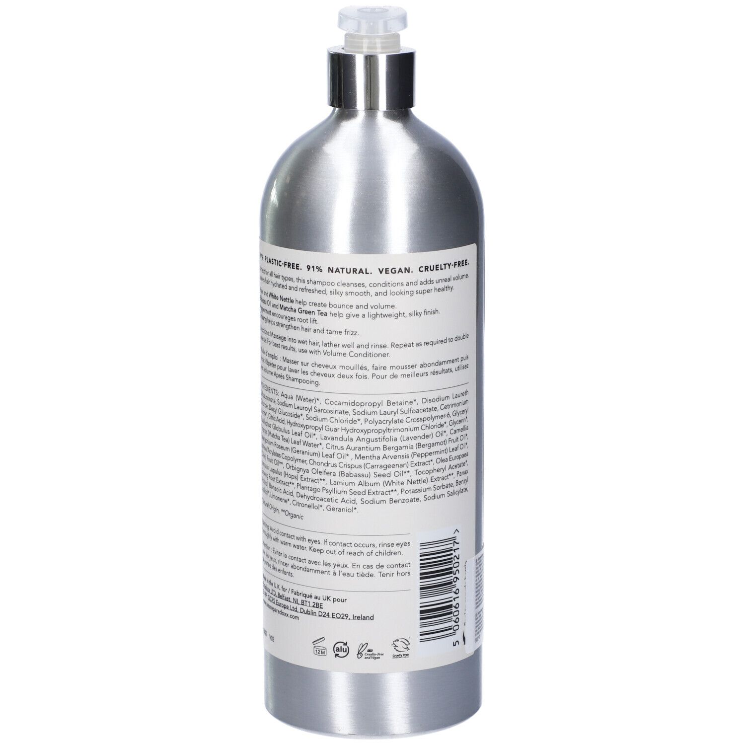 Vista posteriore del flacone di shampoo argento con dosatore. Contiene ingredienti e informazioni. Imballaggio 90% senza plastica.