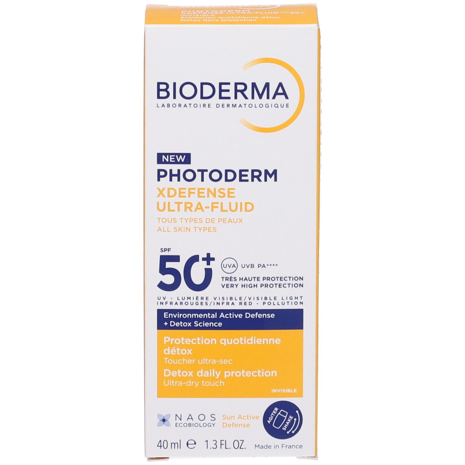 Scatola gialla. Scritte: BIODERMA, PHOTODERM XDEFENSE ULTRA-FLUID SPF50+. Testo multilingue. Logo NAOS.