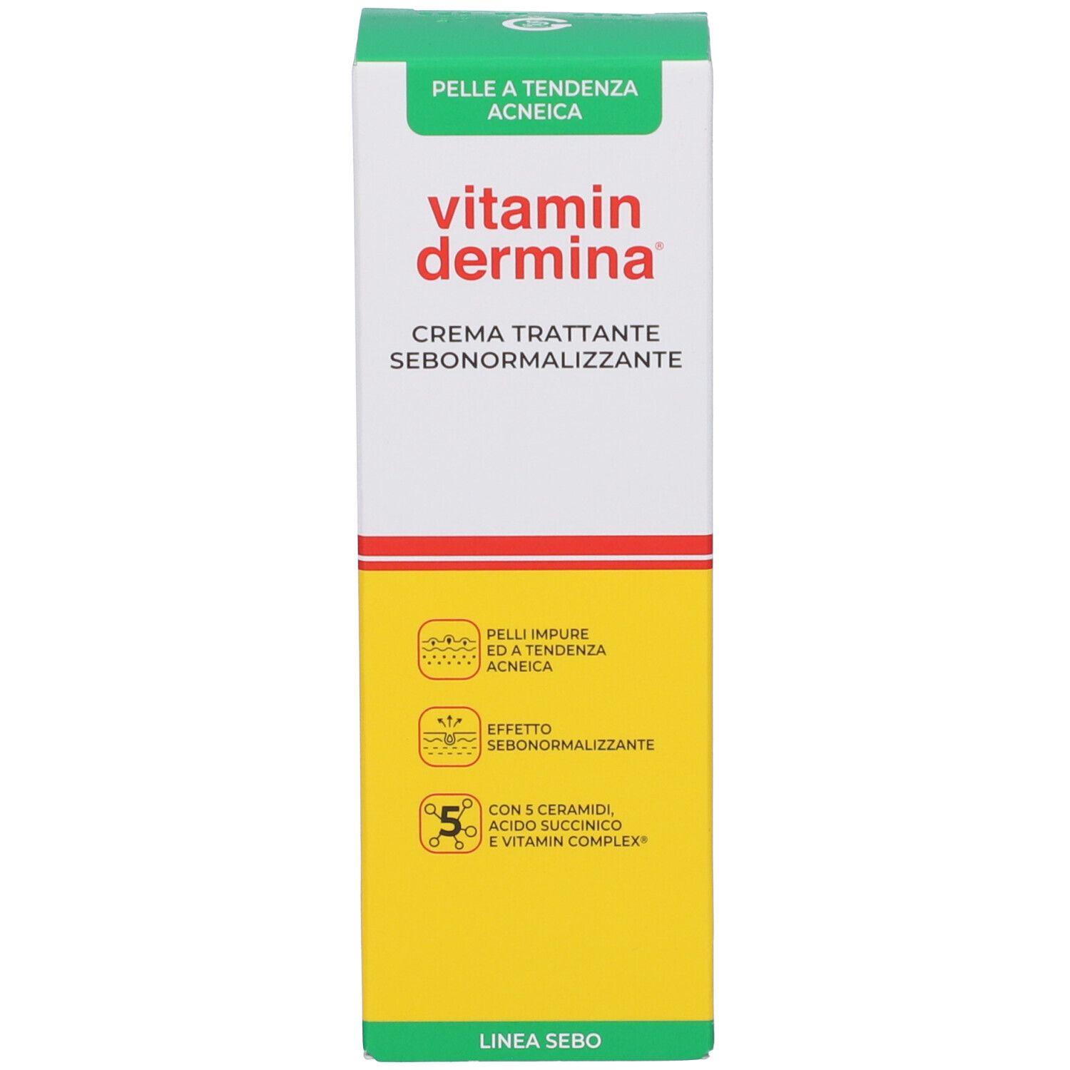Vitamin Dermina Creme-Schachtel, weiß mit grünen und gelben Akzenten. Text: CREMA TRATTANTE SEBONORMALIZZANTE.