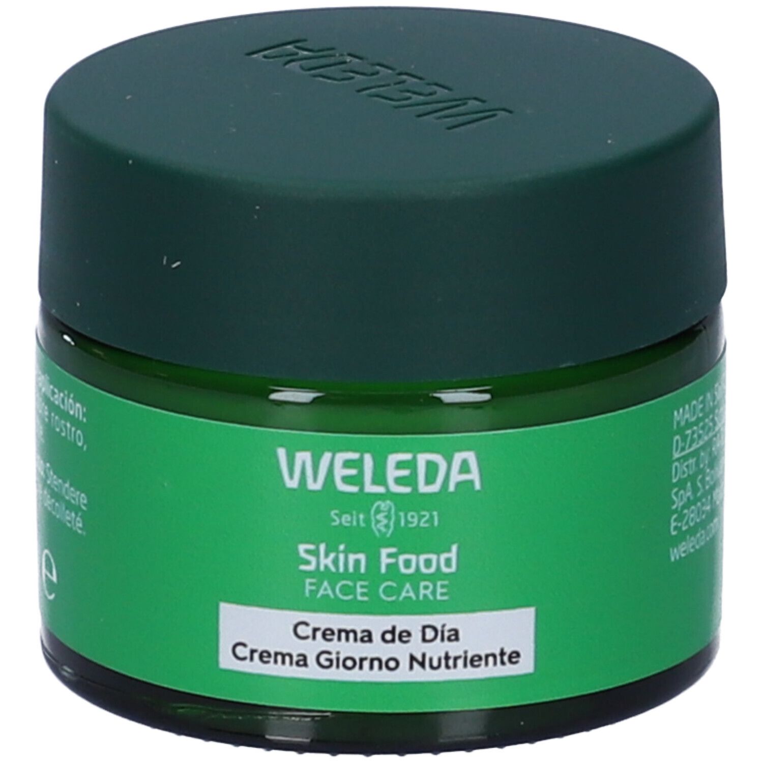 Vasetto verde con coperchio. Scritta: WELEDA Skin Food FACE CARE Crema de Día Crema Giorno Nutriente.