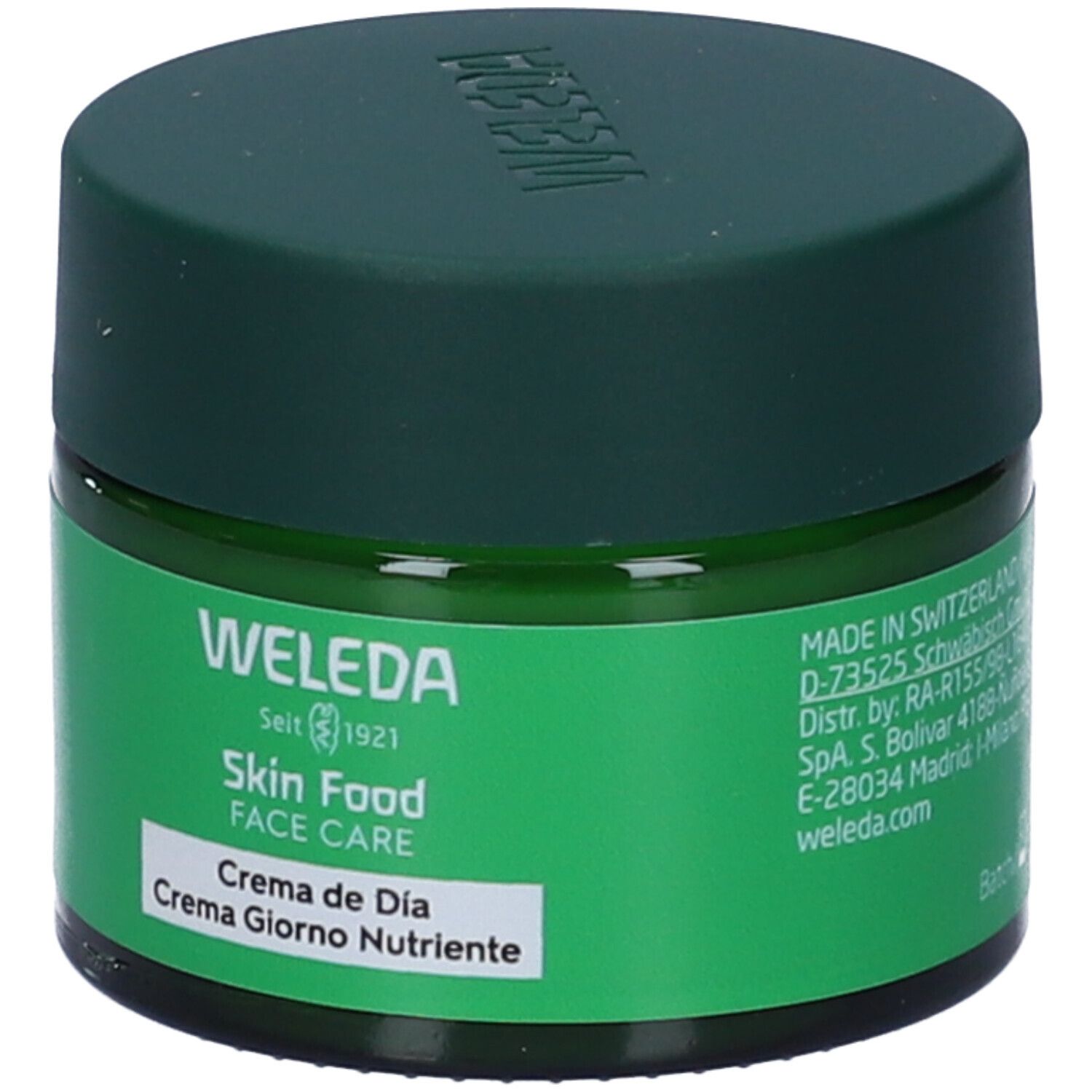 Vasetto verde con coperchio. Scritta: WELEDA Skin Food FACE CARE Crema de Día Crema Giorno Nutriente.