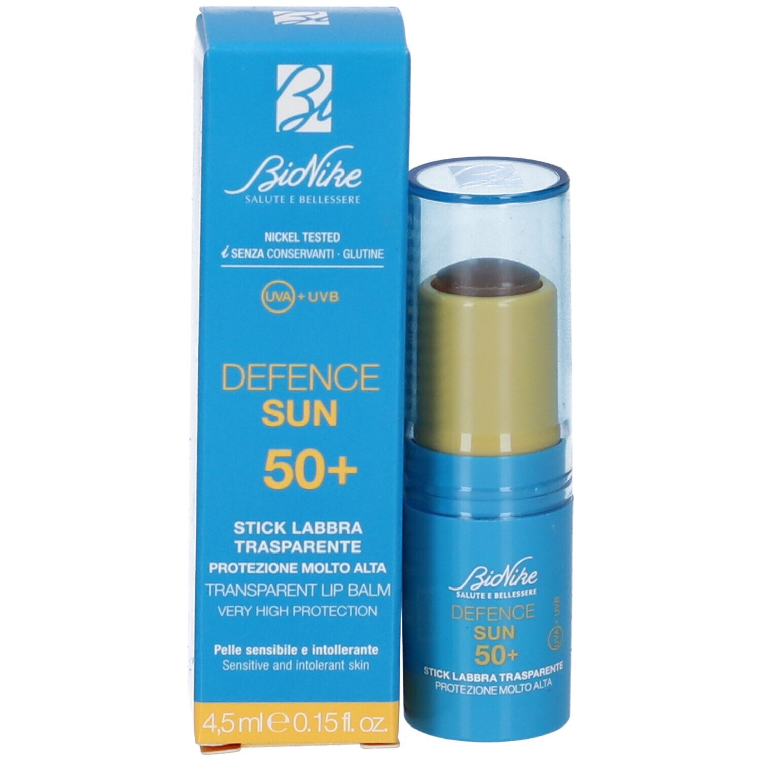 Blauer Karton und Lippenpflegestift. Aufschrift: Defence Sun 50+. Transparent Lip Balm. 4,5 ml.