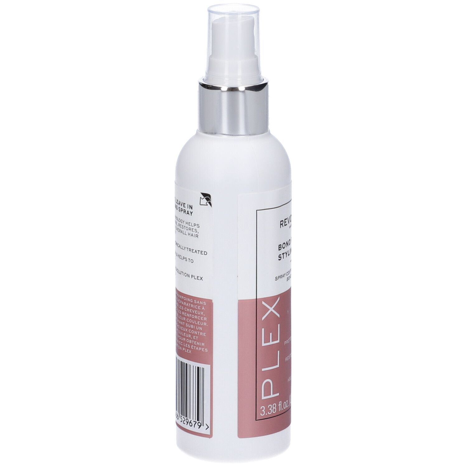 Flacone bianco con vaporizzatore. Scritte e codice a barre su etichetta rosa. Testo: Leave in Conditioner.