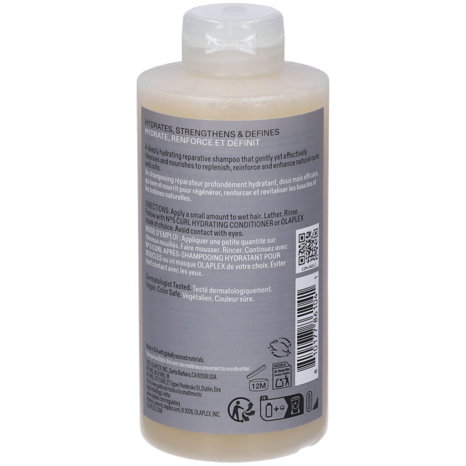 Flasche mit reparierendem Shampoo, das Feuchtigkeit spendet, stärkt und definiert. Enthält Anweisungen und Inhaltsstoffe.