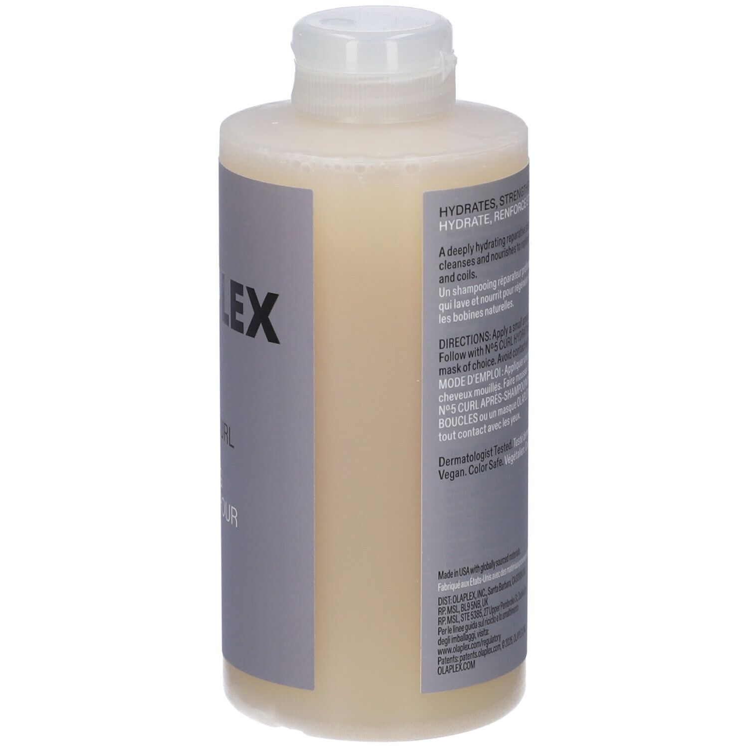 Flasche mit hellgelbem Shampoo, Etikett mit "OLAPLEX" und Anwendungshinweisen.