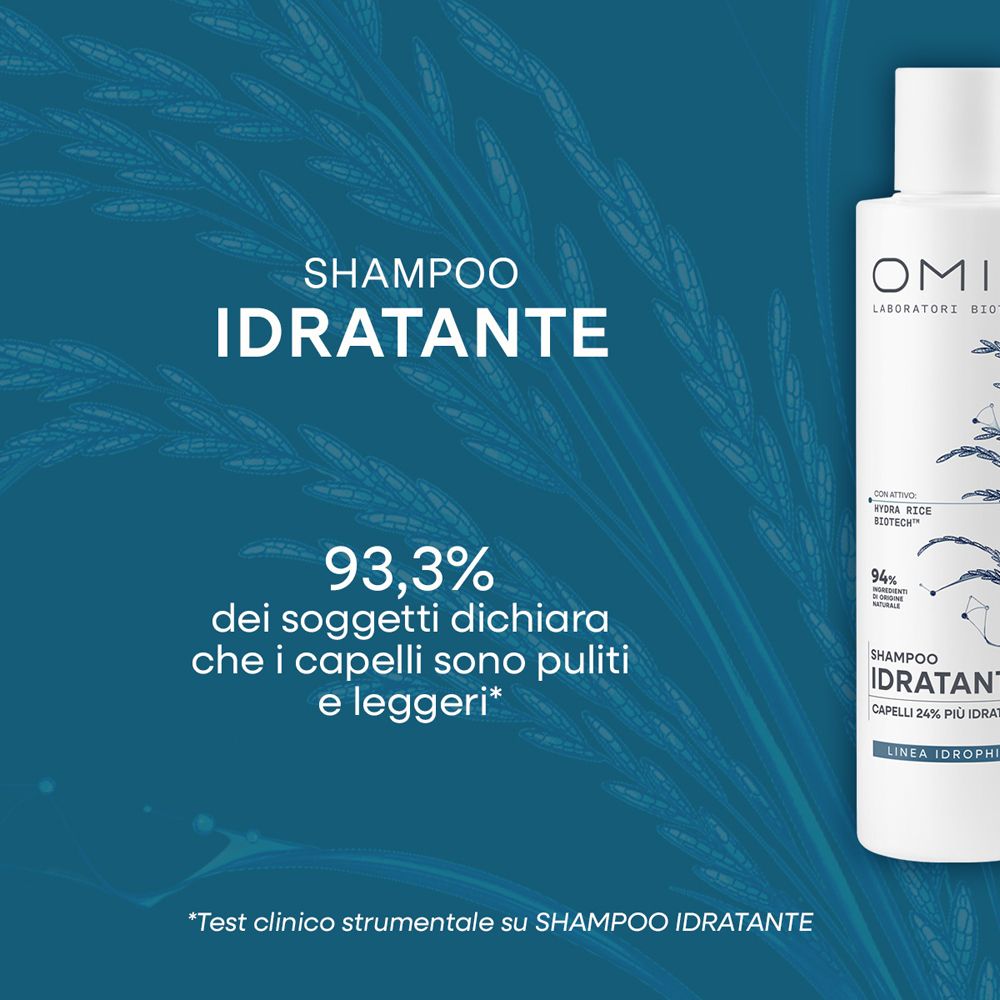 Weiße Flasche mit blauem Etikett, darauf "SHAMPOO IDRATANTE" und eine Prozentzahl.