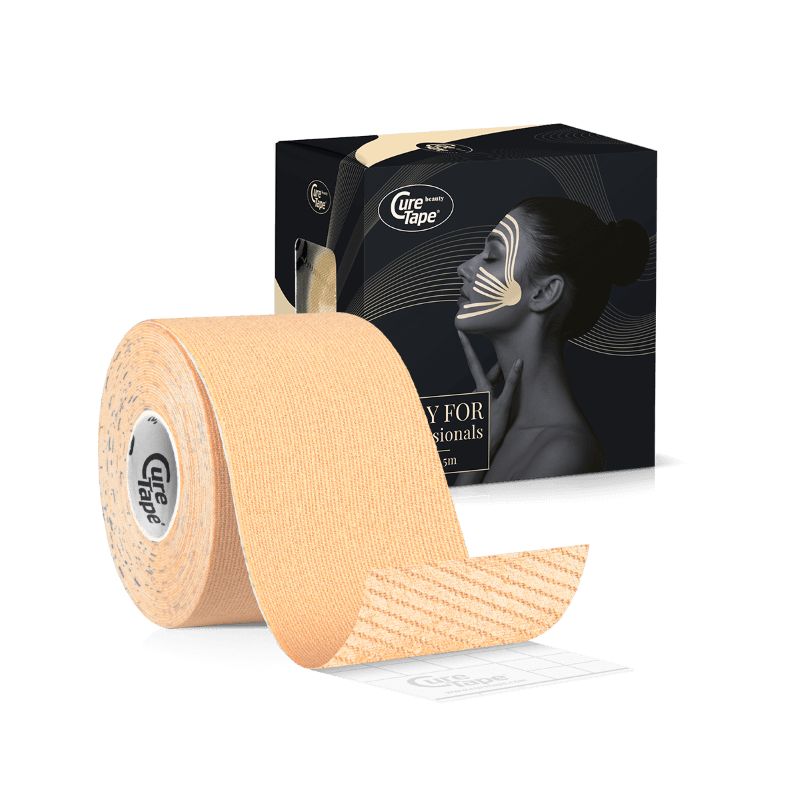 Rolle Gesichts-Tape, beige. Aufdruck CureTape. Verpackung mit Abbildung eines Gesichts mit Tape.