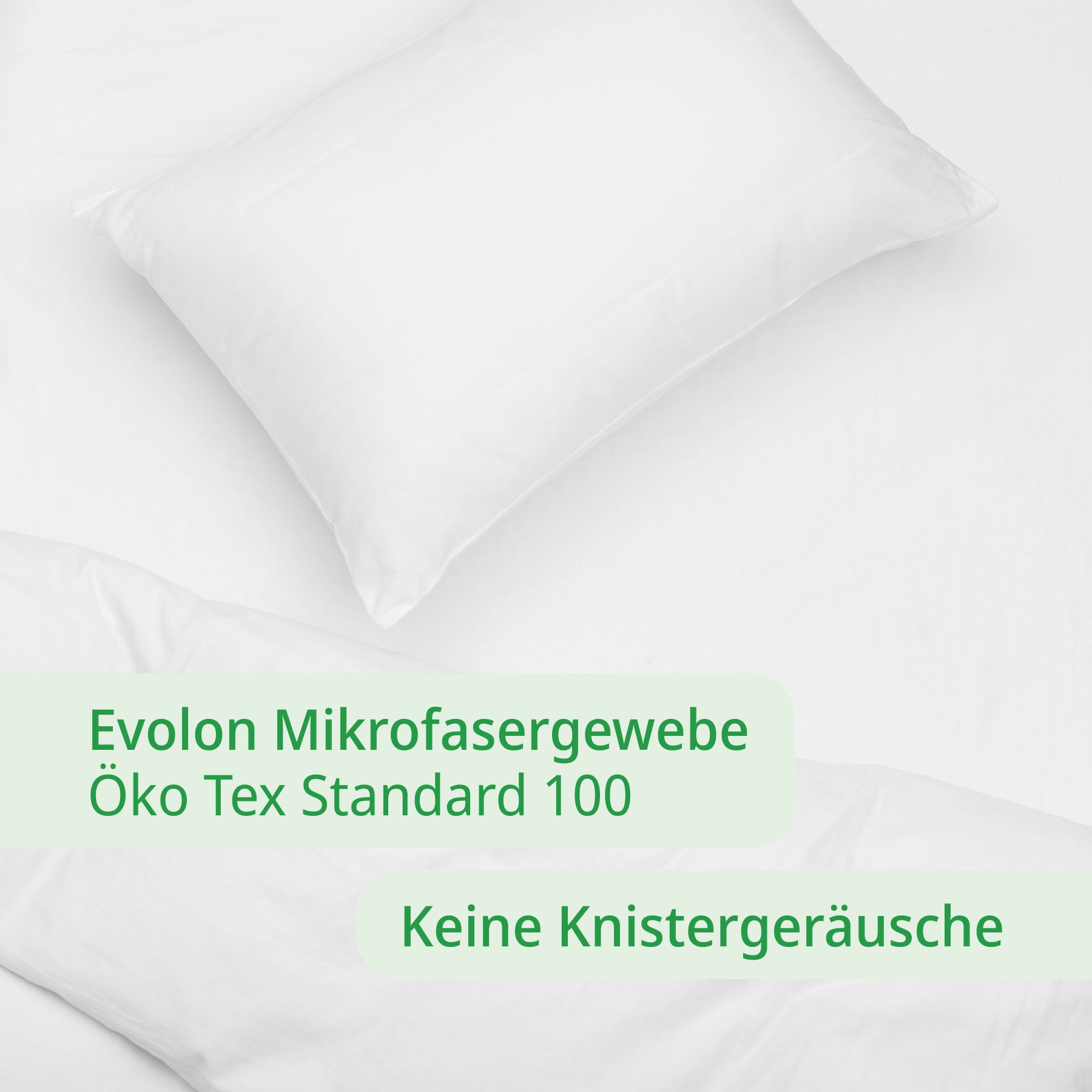 Weißes Kissen auf weißer Bettwäsche. Text: Evolon Mikrofaser, Öko Tex Standard 100, Keine Knistergeräusche.