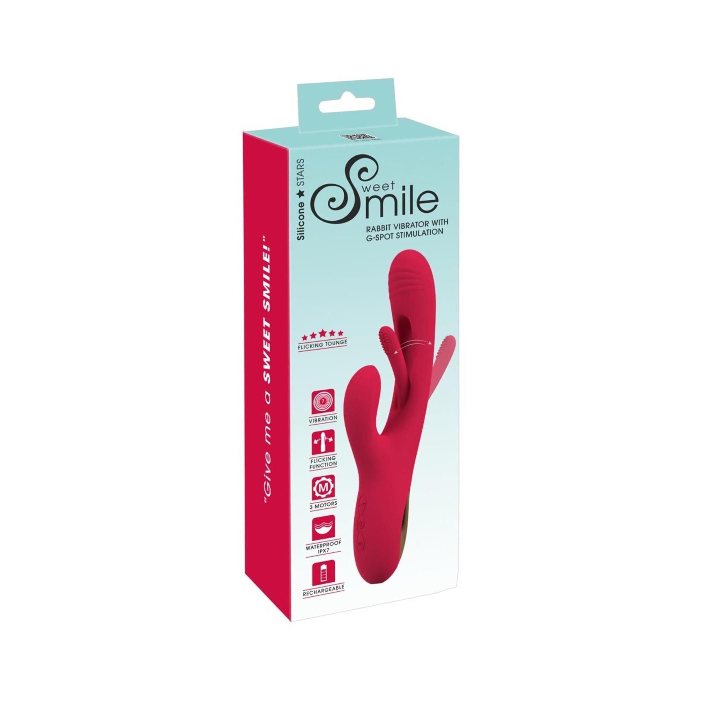 Verpackung mit einem roten Vibrator. Auf der Verpackung steht "Sweet Smile" und "Rabbit Vibrator".