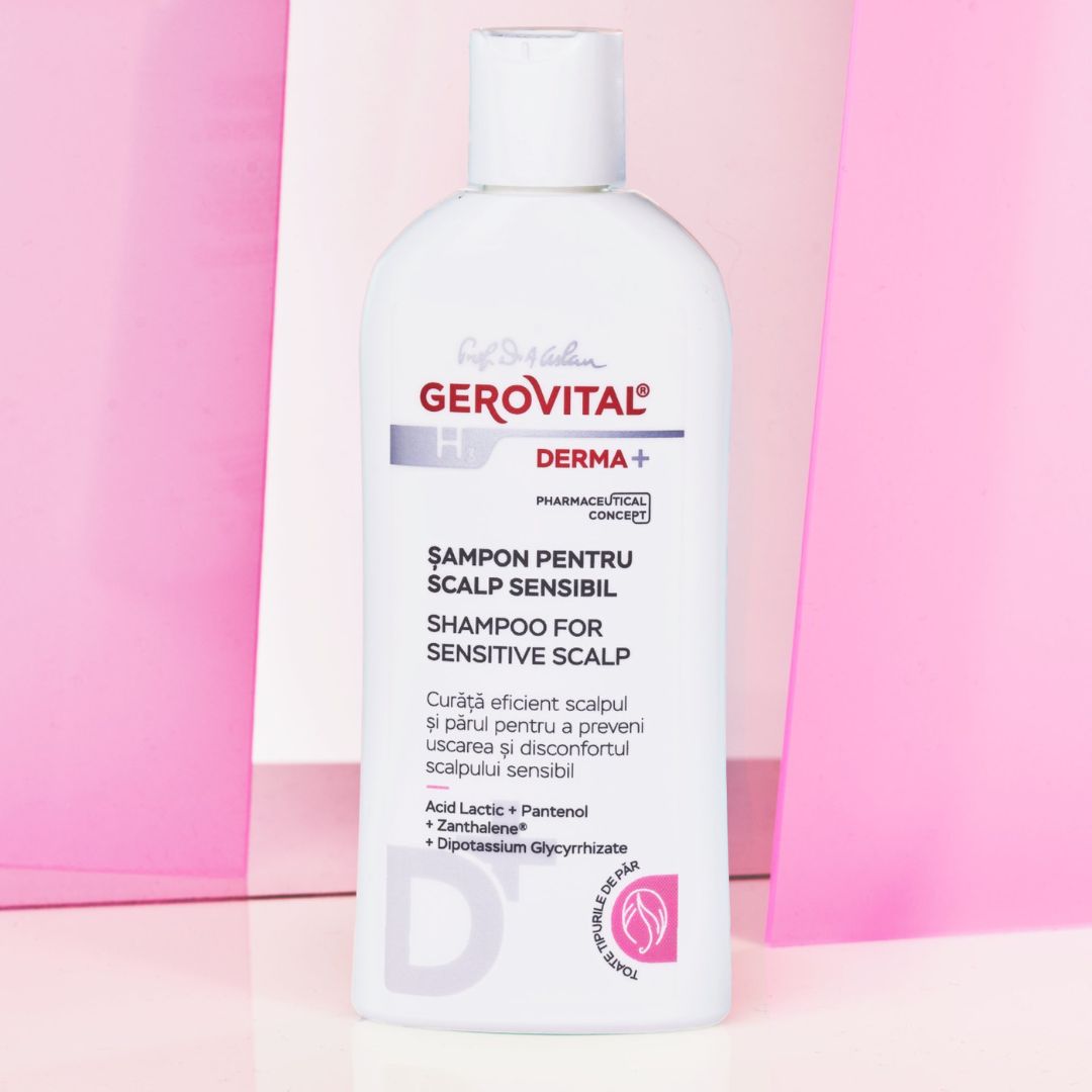Gerovital Shampoo für empfindliche Kopfhaut. Weiße Flasche, rosa Hintergrund. Text und Logo. Derma+.