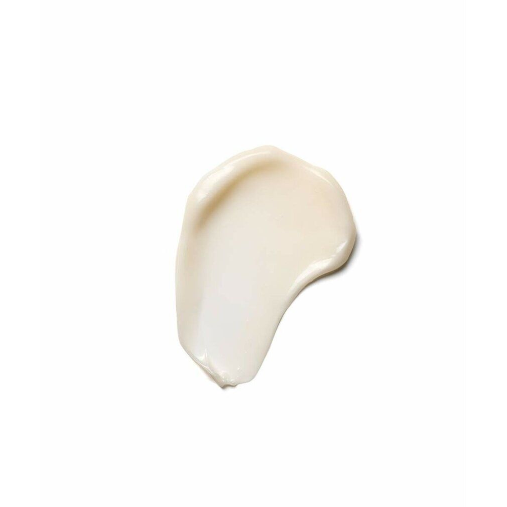 Klecks cremiger, weißer Lotion auf weißem Hintergrund.