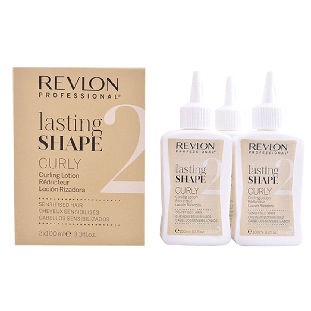 Revlon Lasting Shape 2 Curly Lotion. Drei Flaschen und eine Verpackung. Weiße Flaschen mit weißem Deckel. Beige Verpackung.