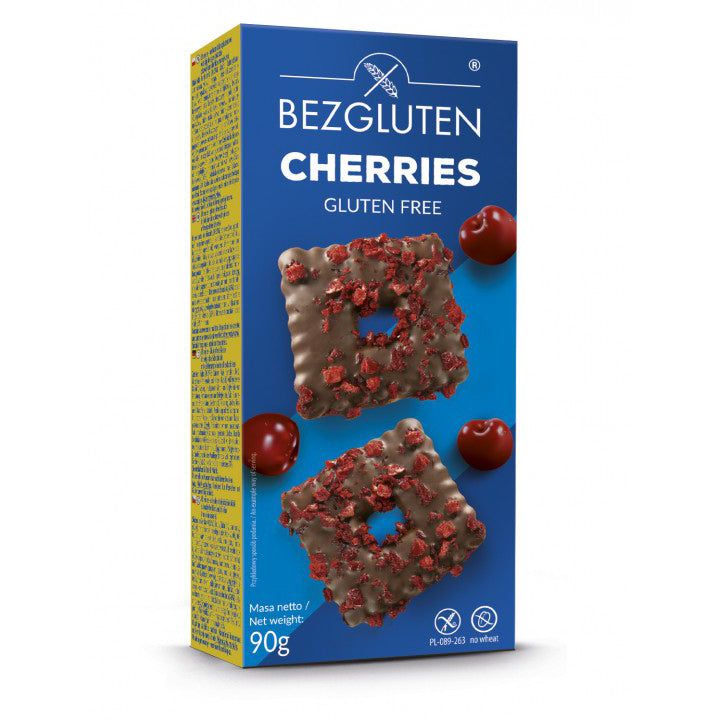 Blau-gelbe Verpackung mit Keksen. Aufschrift: Bezgluten Cherries Gluten Free. Zwei Kekse mit Kirschen und Schokolade.