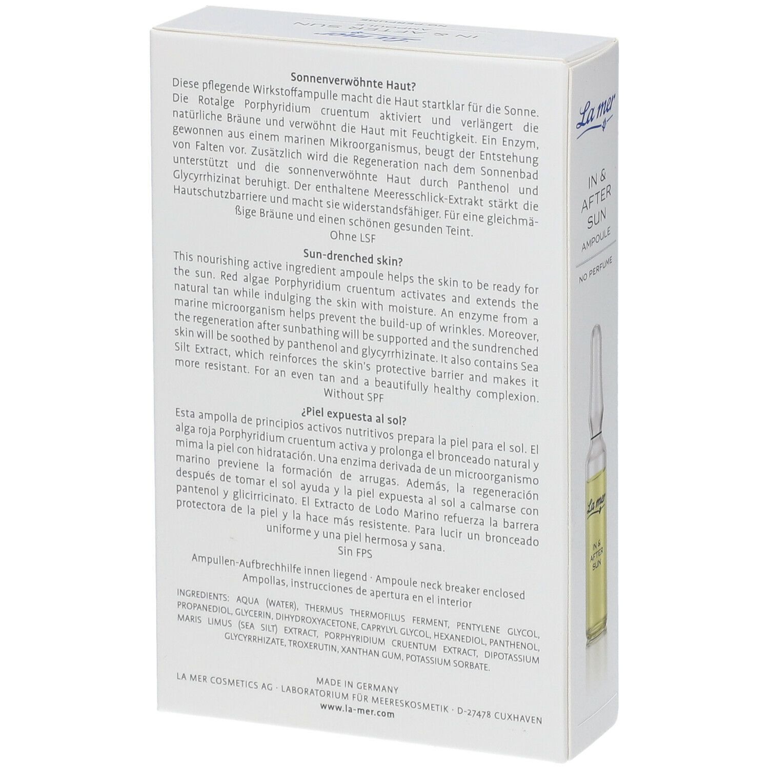 Karton mit Produktinformationen und einer Ampulle. Text in Deutsch, Englisch und Spanisch. Marke: La mer.