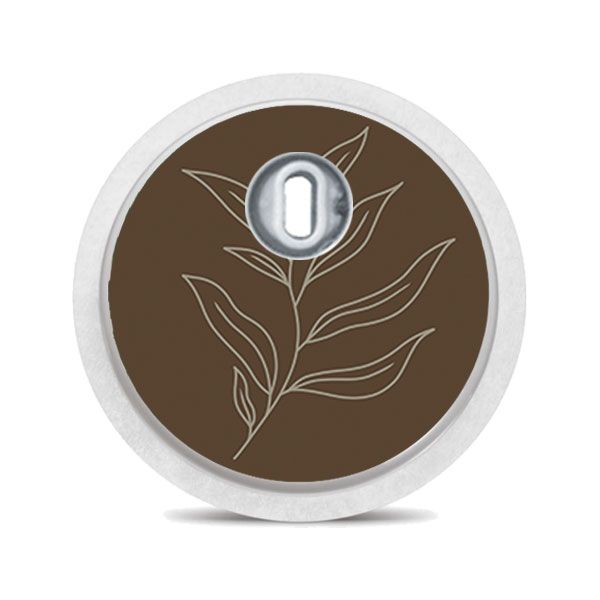 Runder Aufkleber mit Blattmuster. Brauner Hintergrund, beiges Blatt. Für FreeStyle Libre 3.