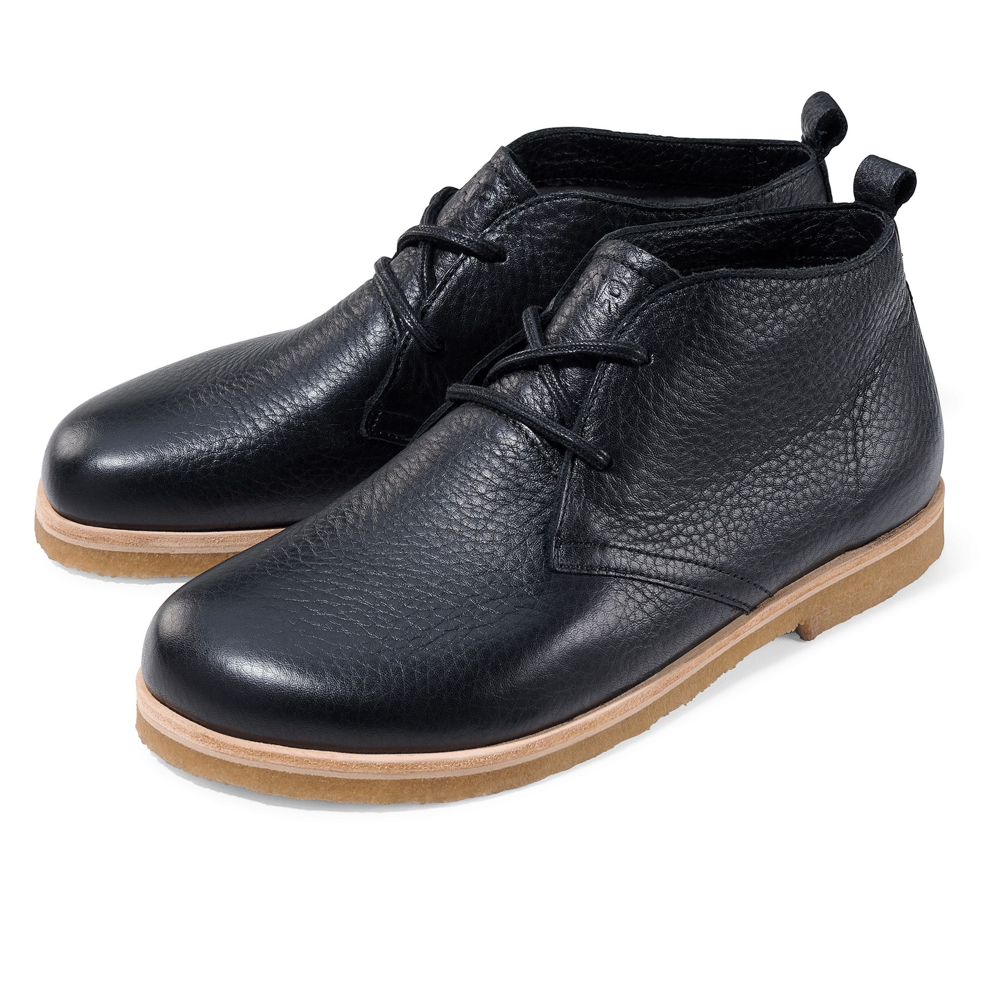 Schwarze Stiefeletten mit Schnürsenkeln und heller Sohle. Lederstruktur sichtbar.