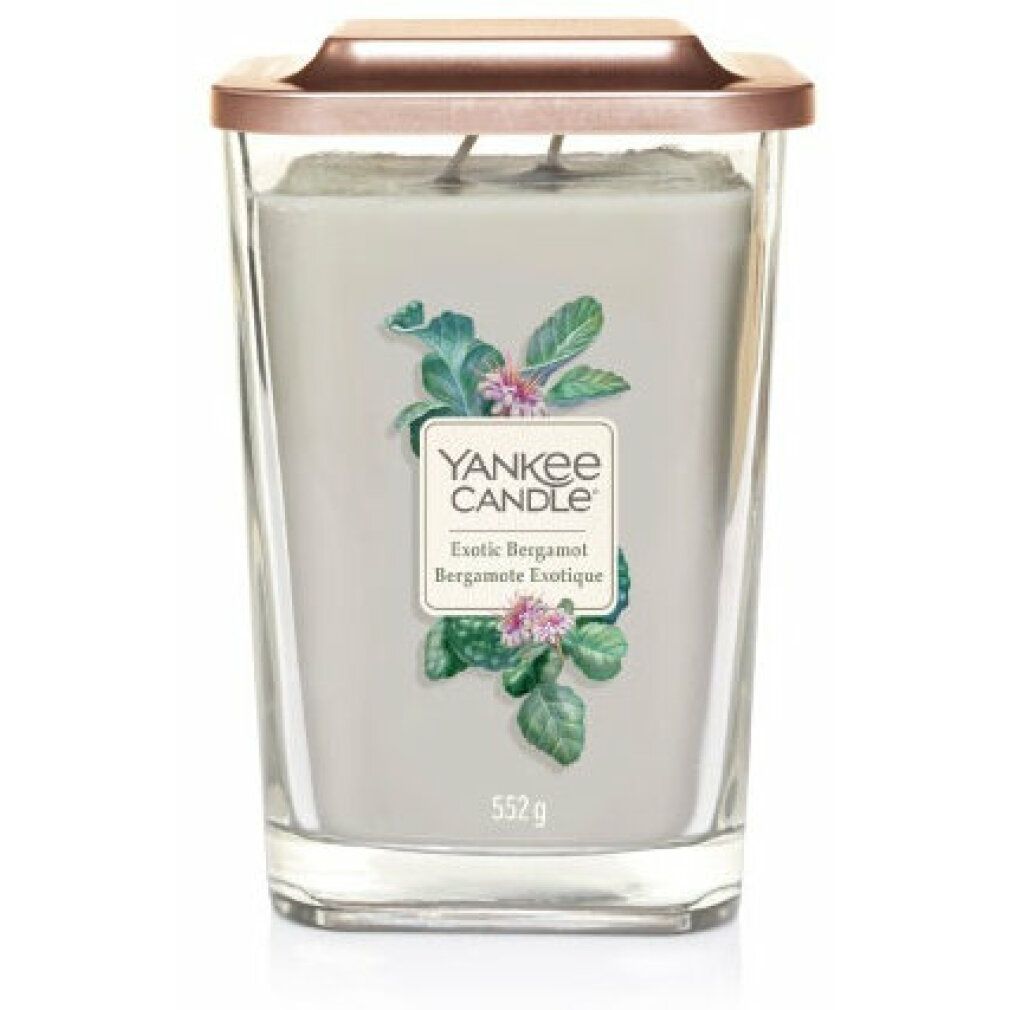 Duftkerze in Glasbehälter mit Deckel. Aufkleber mit floralem Design und Produktbezeichnung. Marke: Yankee Candle. Gewicht: 552 g.