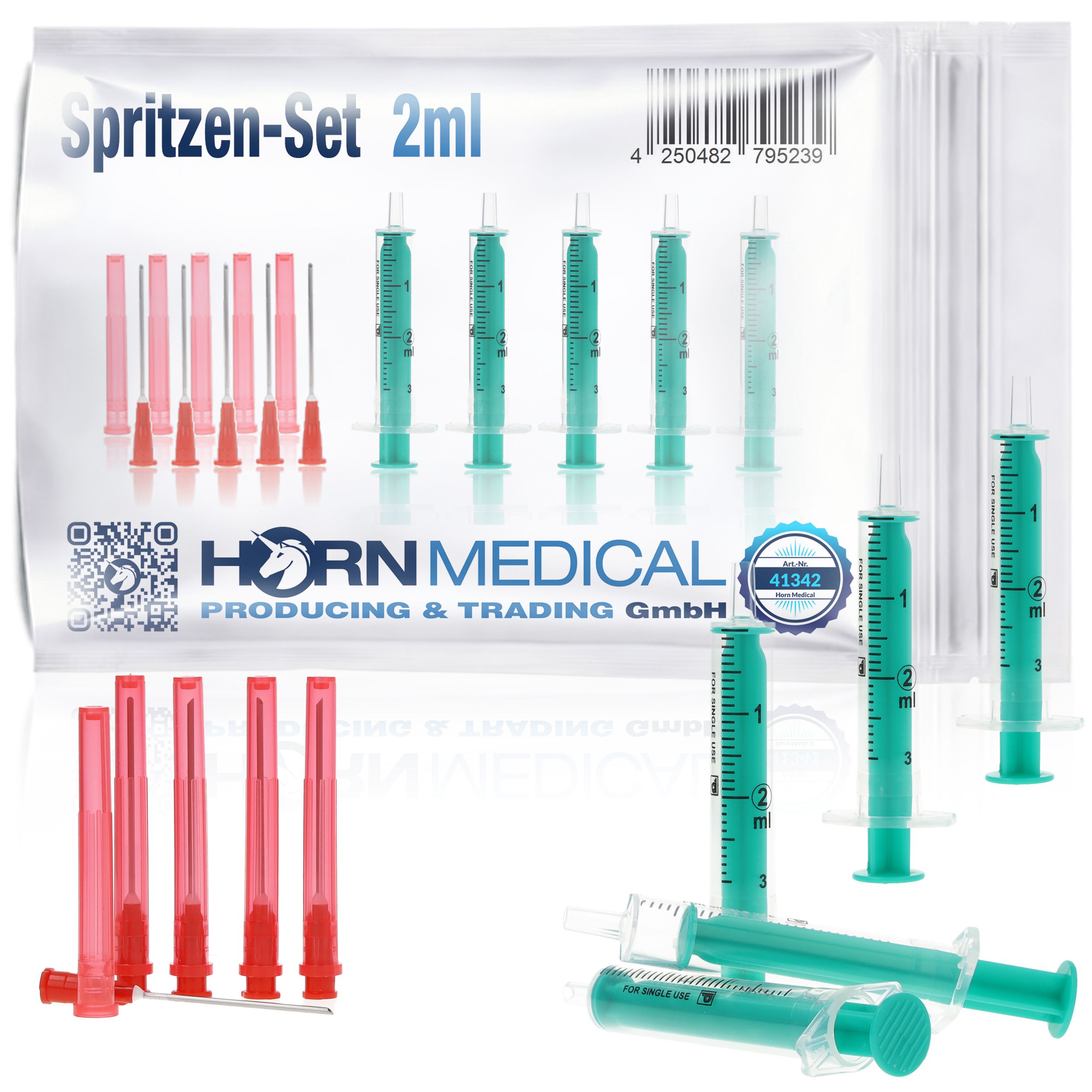 Spritzen-Set 2ml, Horn Medical. Grün-transparente Spritzen, rote Nadeln, transparente Verpackung. Mehrere Sets.