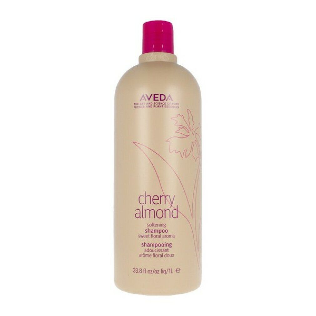 Große, beige Shampoo-Flasche mit pinkfarbenem Deckel. Aufschrift: Aveda, Cherry Almond, softening shampoo. 33.8 fl oz/1L.