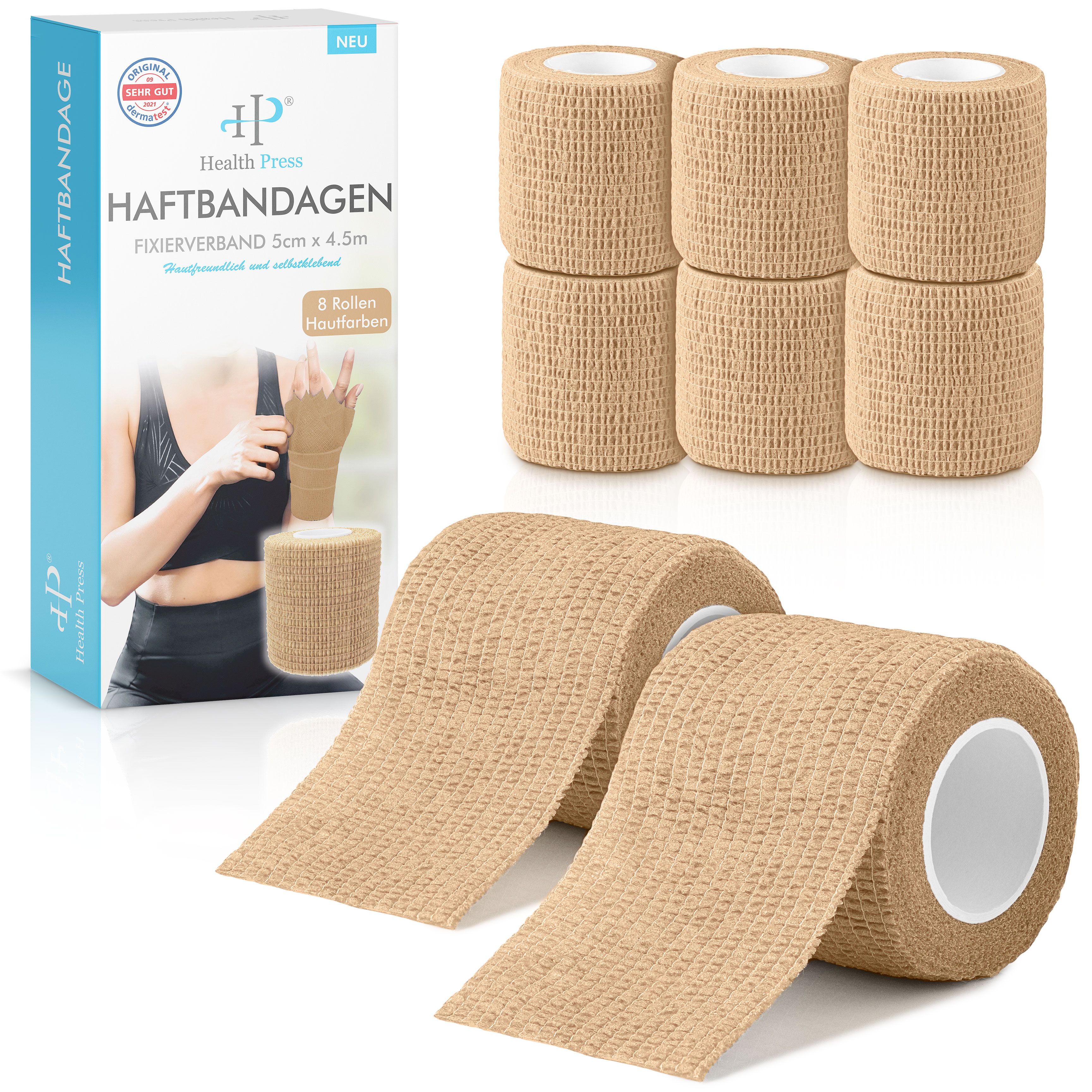 Verbandrollen und Verpackung. Auf der Verpackung steht "Health Press Haftbandagen". Acht Rollen, 5cm x 4,5m. Beige Farbe.