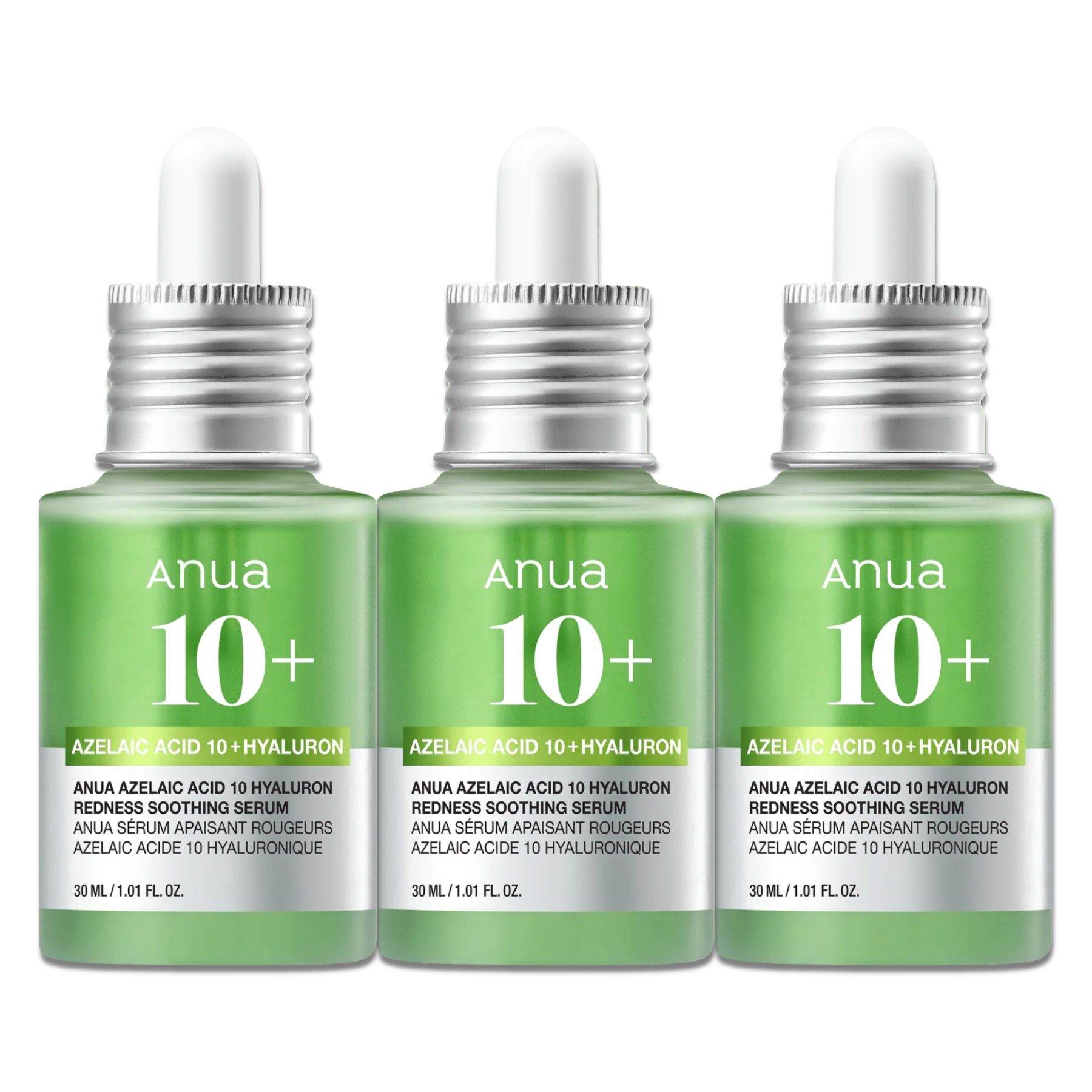 Drei Flaschen Anua 10+ Gesichtsserum. Grüne Glasflaschen mit silbernen Deckeln und Pipetten. Produktetiketten sind sichtbar.