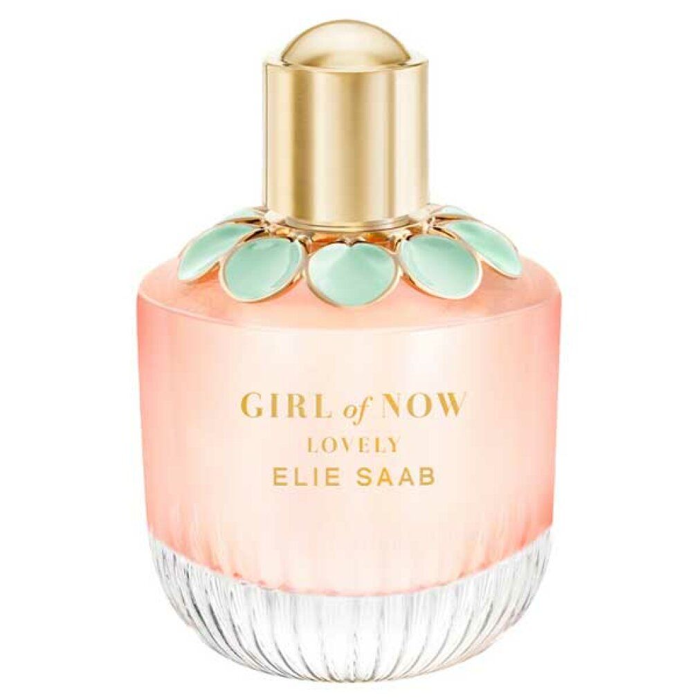 Parfümflasche mit goldfarbenem Deckel, rosa Flüssigkeit und grünen Blütenblättern. Produktname und Marke sind auf der Flasche sichtbar.