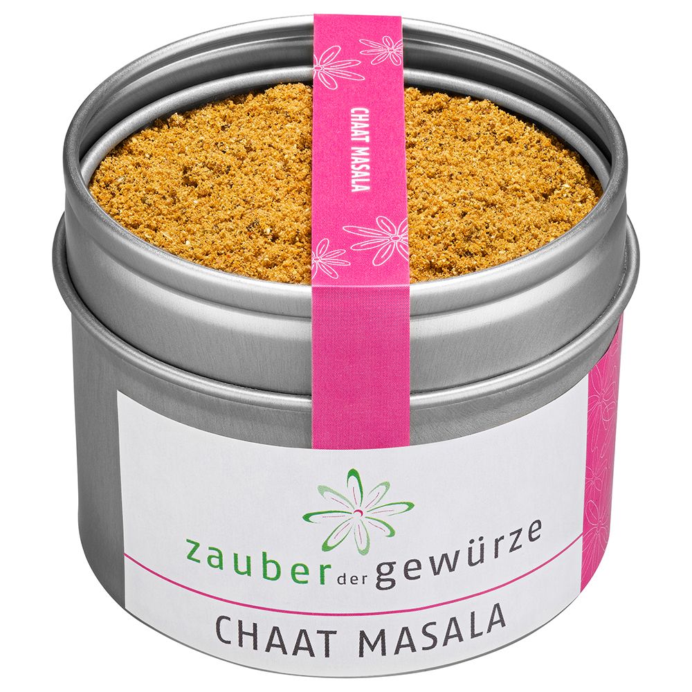Runde Dose mit Gewürz. Rosa Etikett mit 'Chaat Masala'. Weißes Etikett mit 'Zauber der Gewürze'.