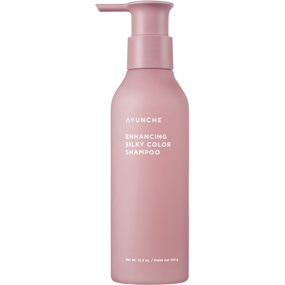 Rosa Shampoo-Flasche mit Pumpe. AYUNCHE und Enhancing Silky Color Shampoo-Text auf der Flasche.