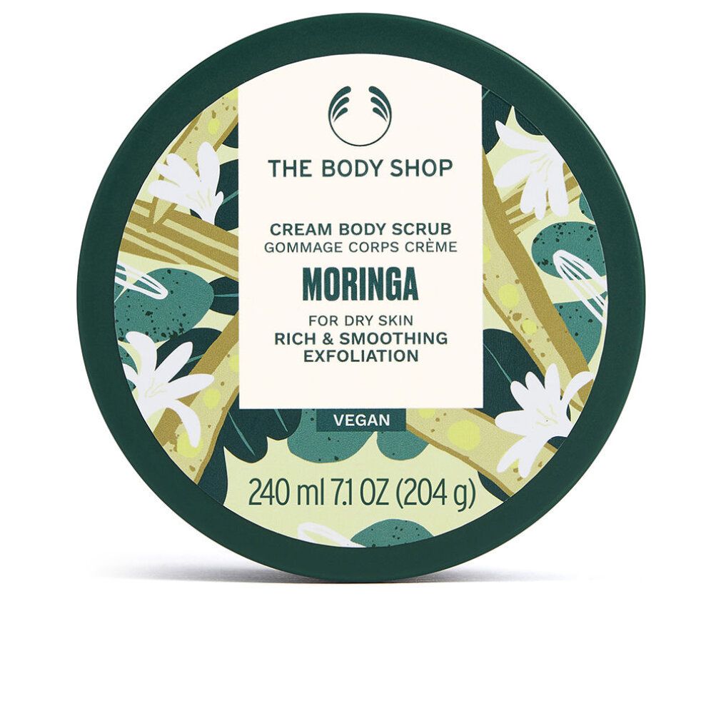 Runder Tiegel mit grünem Deckel. Aufkleber mit Produktbezeichnung: Cream Body Scrub Moringa. Vegan-Siegel. Volumen: 240 ml.