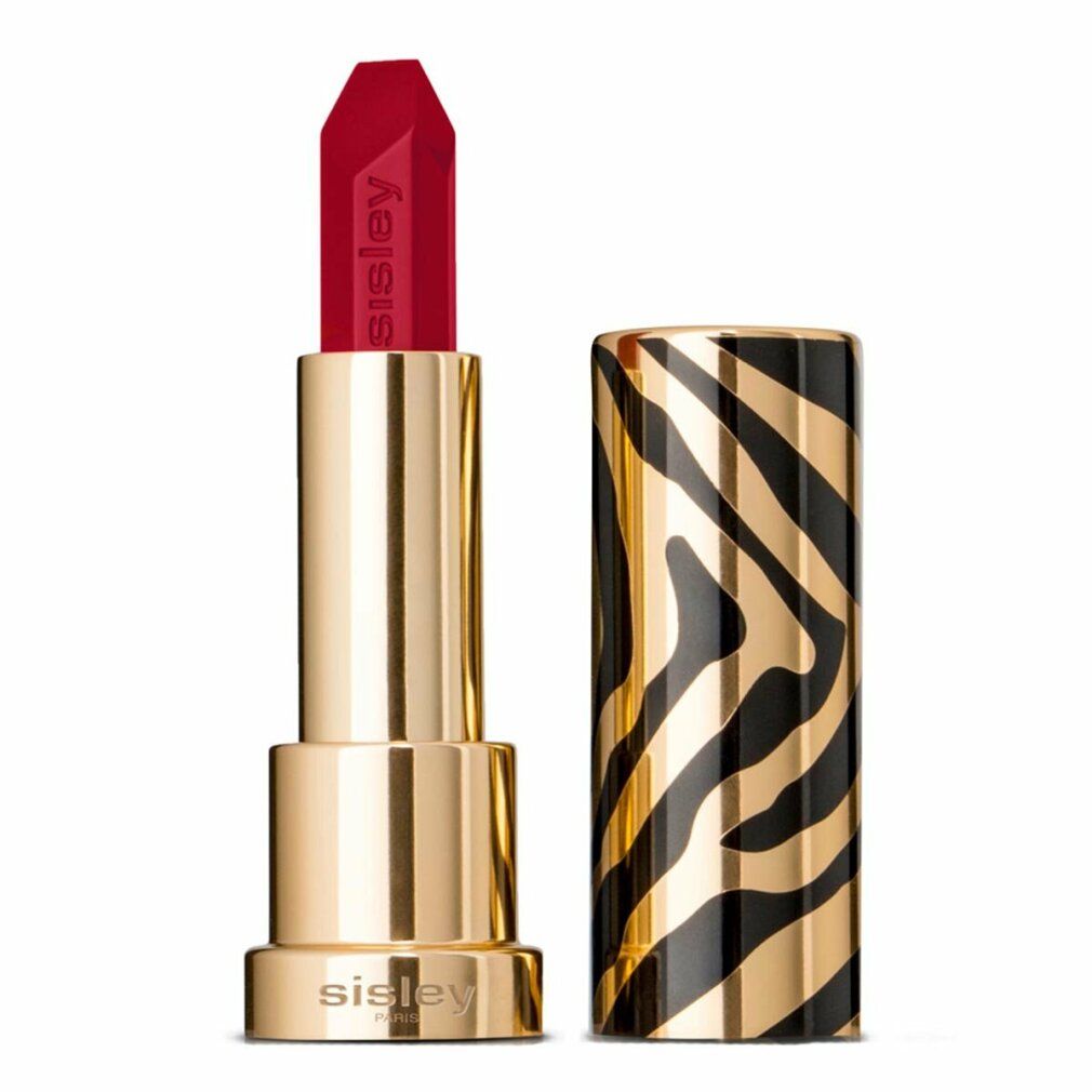 Sisley Le Phyto Rouge Lippenstift, geöffnet. Goldfarbener Stift, roter Lippenstift, schwarze und goldene Zebra-Hülle. Sisley-Logo auf dem Stift.