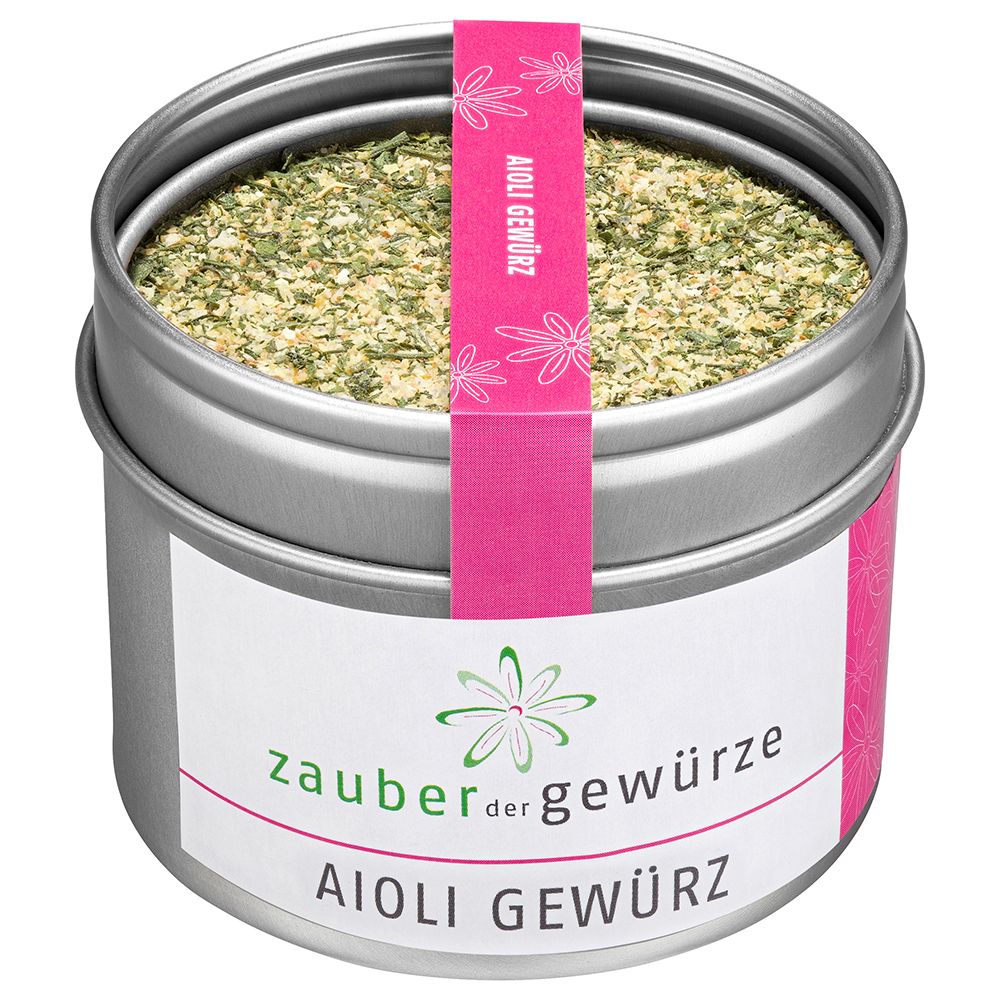 Runde Dose mit Aioli-Gewürz. Rosa Etikett mit Aufschrift "Aioli Gewürz". Weißes Etikett mit "Zauber der Gewürze".