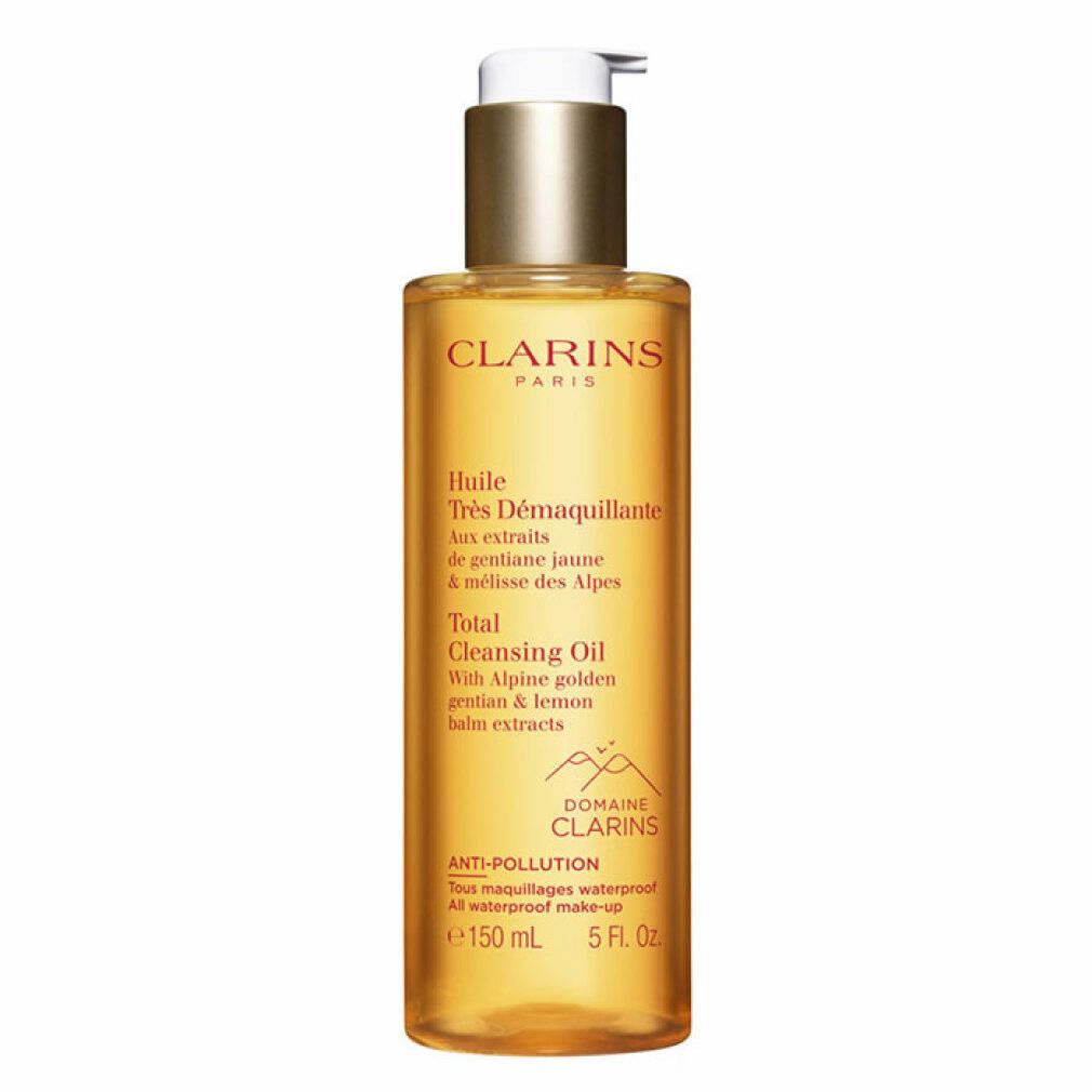 Klare Flasche mit goldfarbenem Inhalt und Dosierpumpe. Beschriftung: Clarins Total Cleansing Oil, 150 ml.