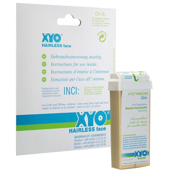 XYO Hairless Face Wachs-Kartusche und Verpackung. Produktname und Text in Deutsch, Englisch, Französisch und Italienisch.