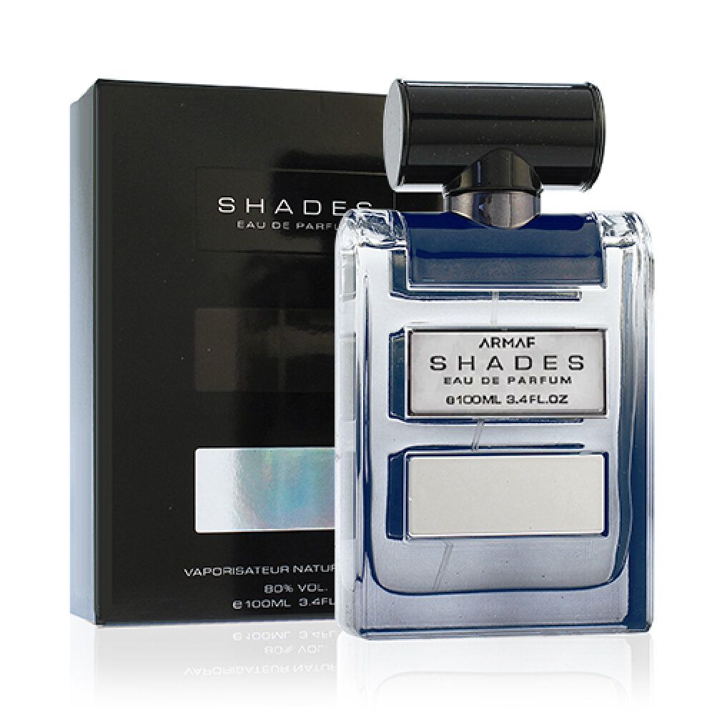 Schwarze Schachtel und Flakon. Flakon mit drei rechteckigen Feldern. Text: ARMAF SHADES Eau de Parfum. 100ml 3.4FL OZ.