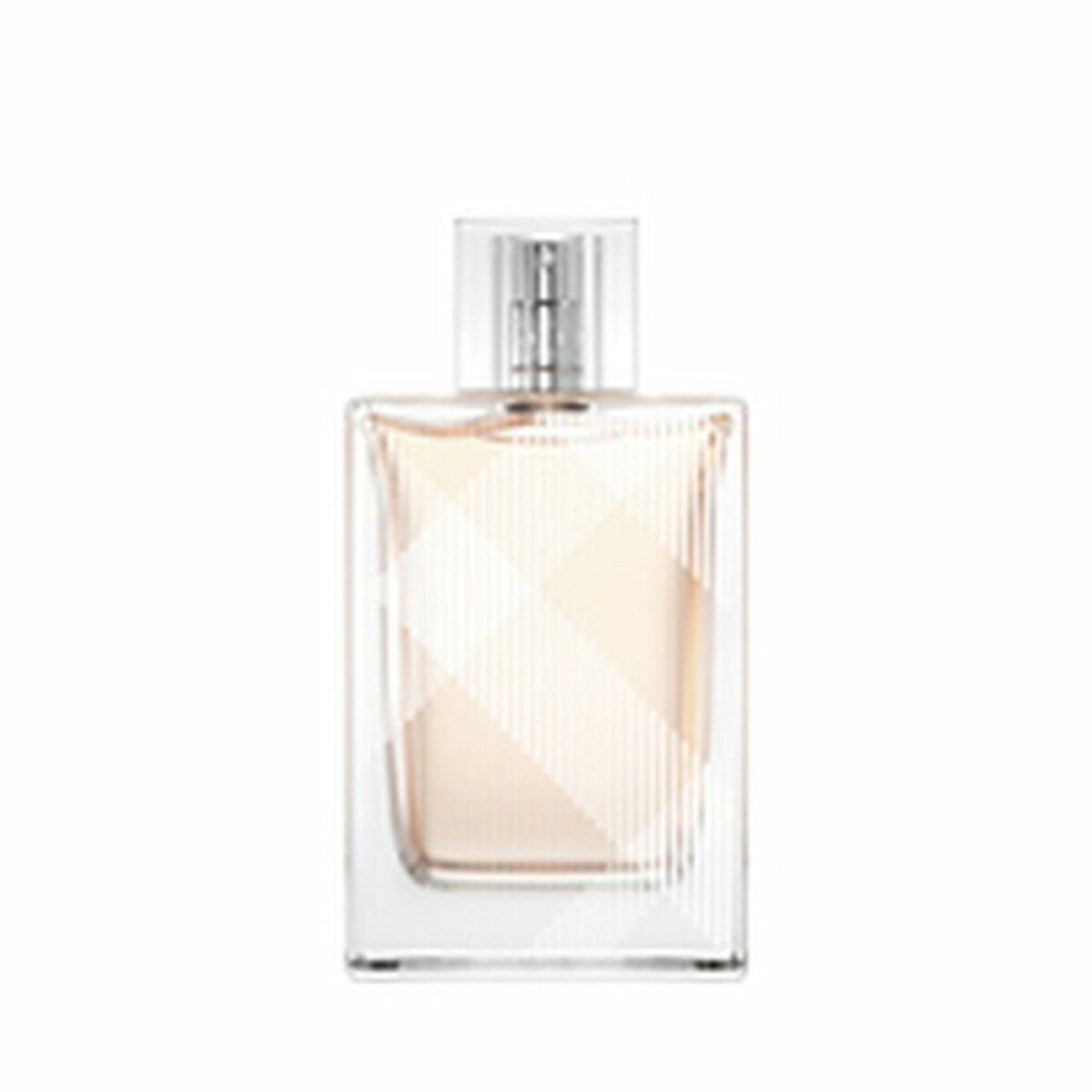 Burberry Brit Eau de Toilette Spray. Transparenter Flakon mit silbernem Zerstäuber. Beige Flüssigkeit, kariertes Muster.