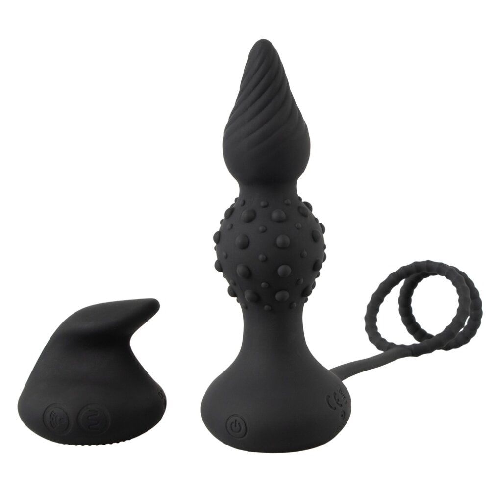 Schwarzes Wellness-Produkt mit Penisring und separatem Aufsatz. Mit strukturierten Oberflächen.