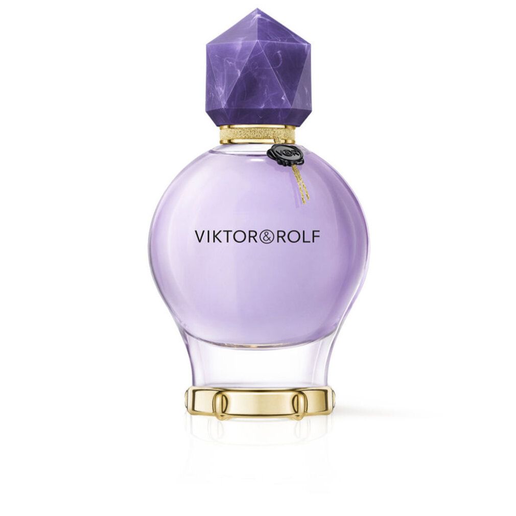 Viktor & Rolf Good Fortune Flakon. Runder, lila Flakon mit Kristallverschluss und goldenem Ring am Boden.