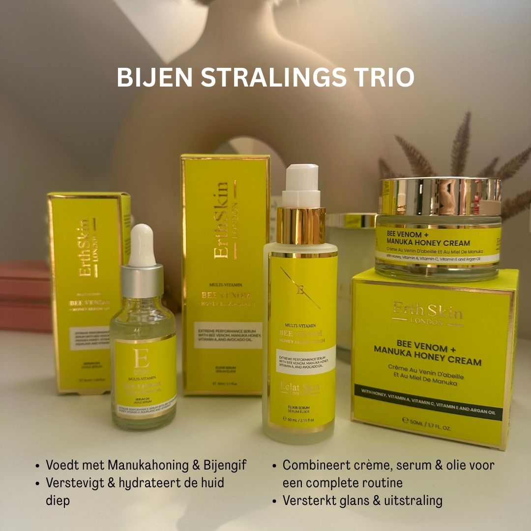 ErthSkin-Trio mit Serum, Creme und Öl. Gelbe Verpackung mit Text. Produkte auf gelben Schachteln platziert.