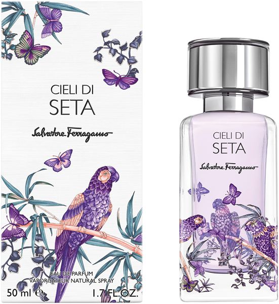 Salvatore Ferragamo Cieli di Seta Eau de Parfum Flakon und Verpackung mit lila Vogel- und Schmetterlingsmotiv.