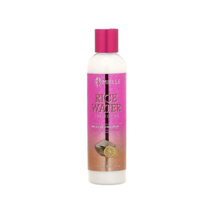 Flasche Mielle Reiswasser Feuchtigkeitsmilch. Rosa Etikett mit Produktnamen und Illustrationen. Rosa Verschluss.