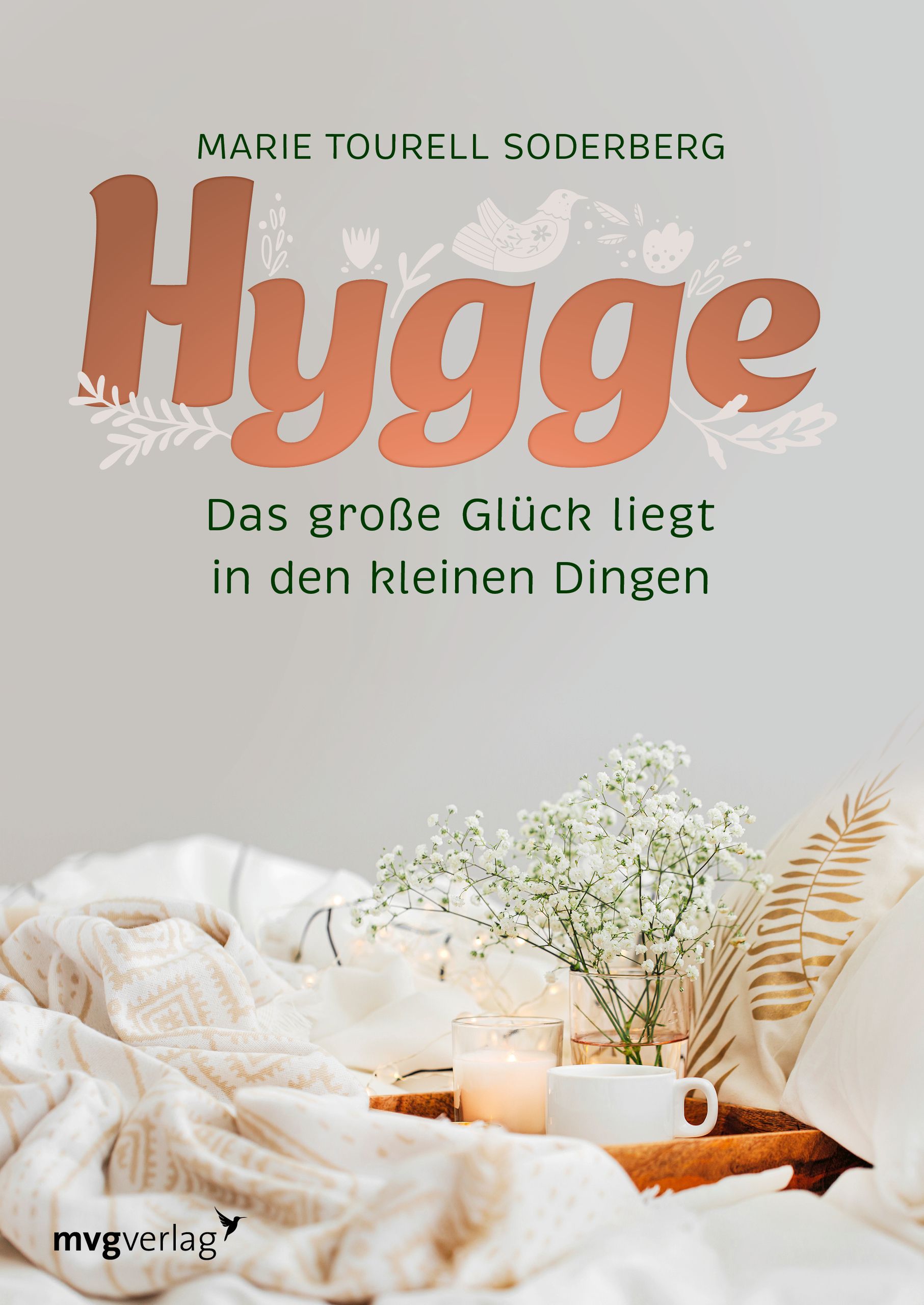 Buchcover mit Titel "Hygge". Autor: Marie Tourell Soderberg. Aufschrift: Das große Glück liegt in den kleinen Dingen. Verlag: mvgverlag.