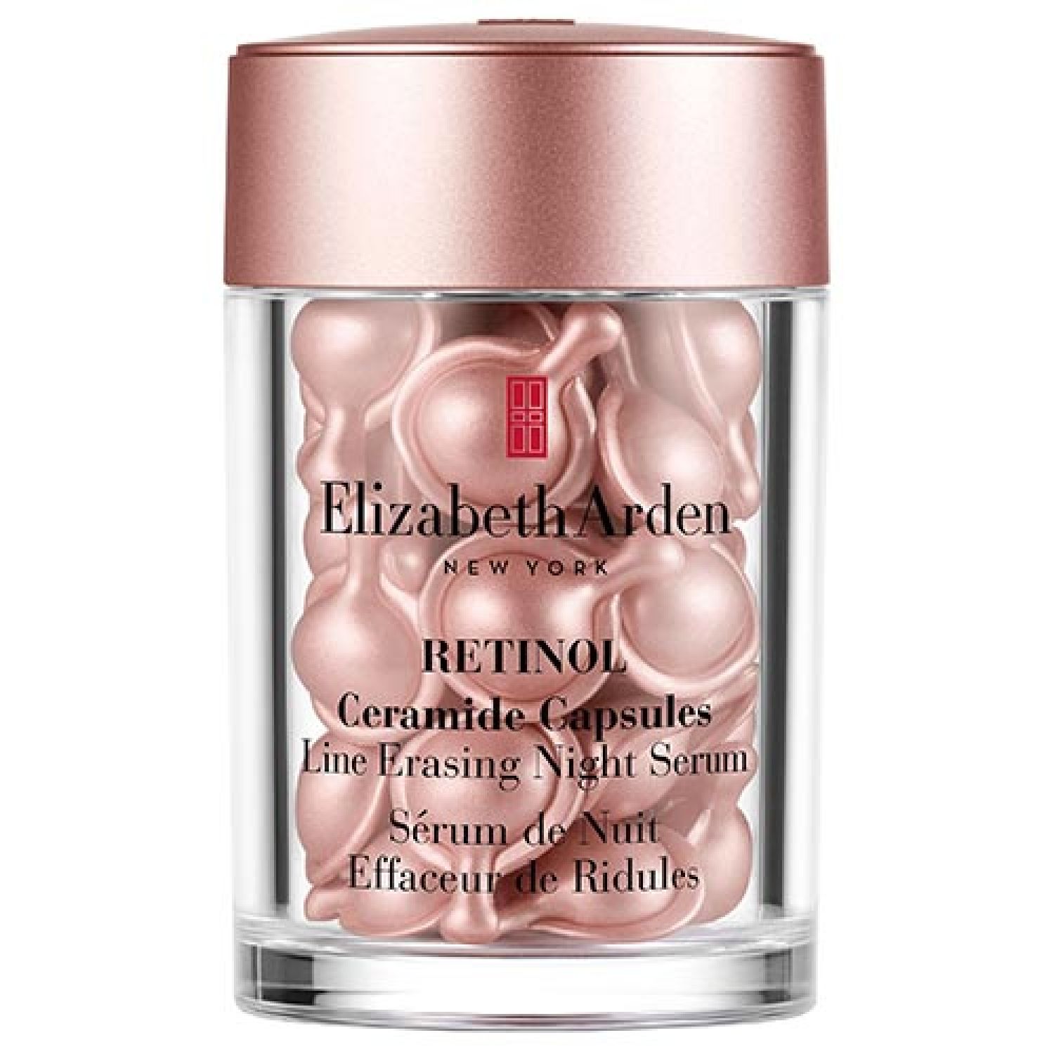 Behälter mit rosa Kapseln. Aufschrift: Elizabeth Arden, Retinol Ceramide Capsules, Line Erasing Night Serum.