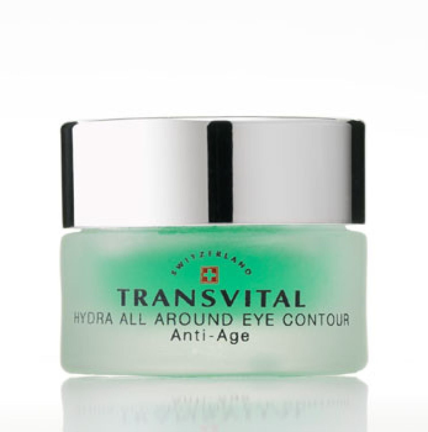 Grünes Glas mit silbernem Deckel. Aufschrift: TRANSVITAL, HYDRA ALL AROUND EYE CONTOUR, Anti-Age. Schweizer Kreuz.